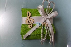 cuscinetto verde con chiave di violino